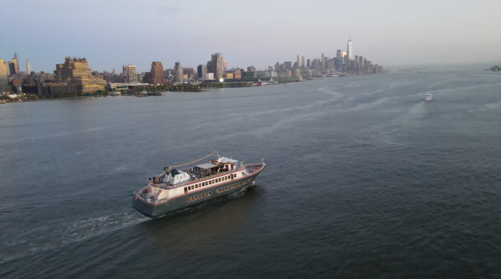 Princess sailing on Hudson River toward Statue of Liberty